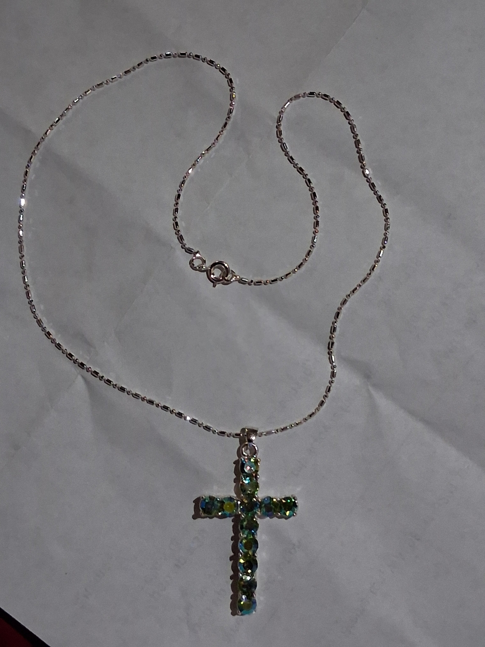 Silver Cross Necklace with Green Crystal Accents